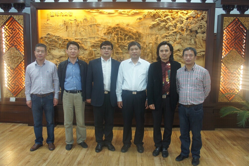 浙江省文化厅金兴盛厅长莅临黄小明木雕艺术馆和个木园5